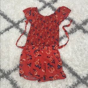 Red top and bottom with floral pattern